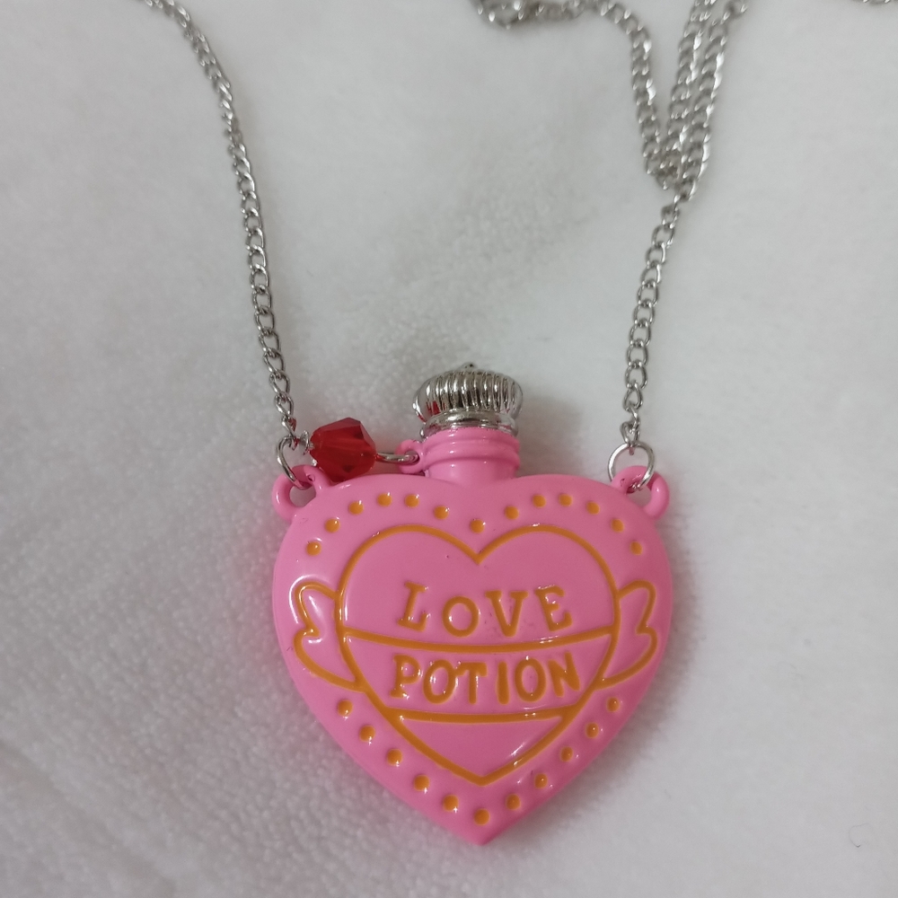 Pink heart love potion necklace
